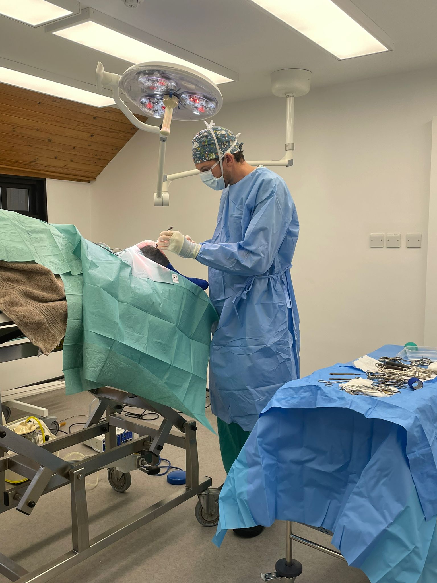 Simon in the new theatre performing orthopaedic surgery